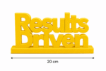 Energy meets execution. This bold yellow, 3D-printed "Results Driven" desk plaque is designed for high-velocity teams that live by their KPIs. Ideal for sales floors, marketing agencies, and software development sprints, this premium sign adds a splash of motivation and modern tech style to any workstation.